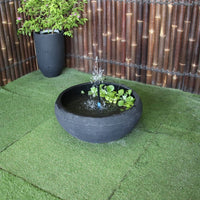 Small Fish Pond fountain by Galleria in charcoal top angle view into pond with greenery