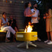 ALUVY SAM Original Low Brazier Sunflower With Flame and People at the background