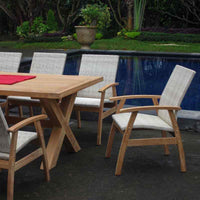 Flinders Wicker Chair in White Kubu next to pool