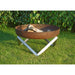 Alfred Riess Darvaza Steel Fire Pit Medium on the lawn