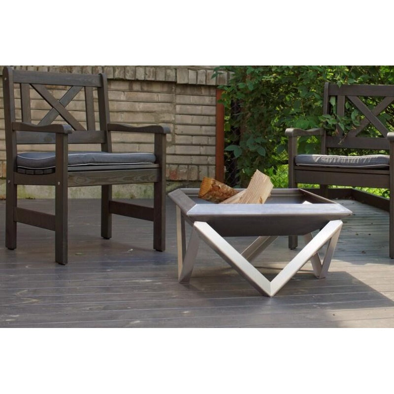 Alfred Riess Kubas Steel Fire Pit Medium with chairs behind