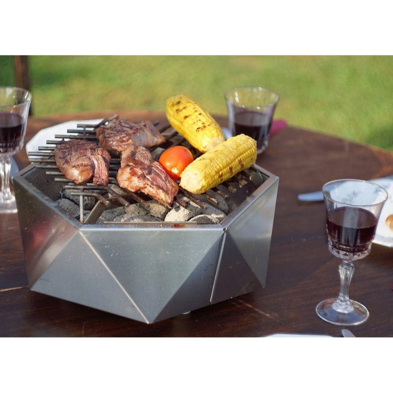 Alfred Riess Stalvirsis Portable Hibachi Grill with food on Grill