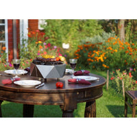 Alfred Riess Stalvirsis Portable Hibachi Grill on outdoor dining table