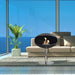 Cocoon Fires Pedestal Fireplace Black and Stainless Steel with ocean background