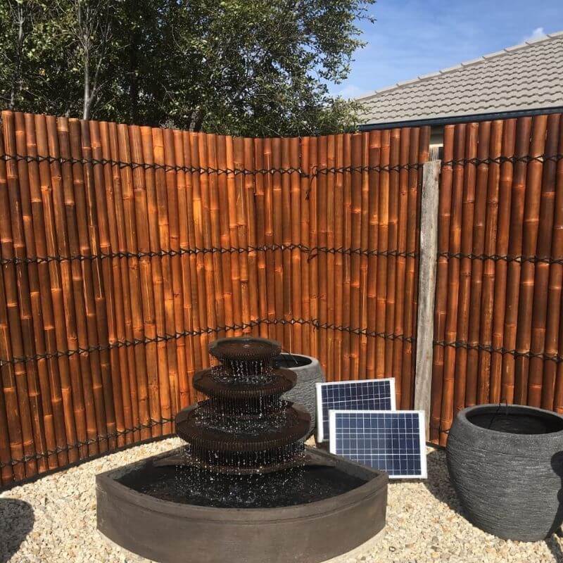 Corner Bowl Fountain Rust surround bamboo wall