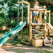 Discovery Woodland Treehouse Girl playing on top
