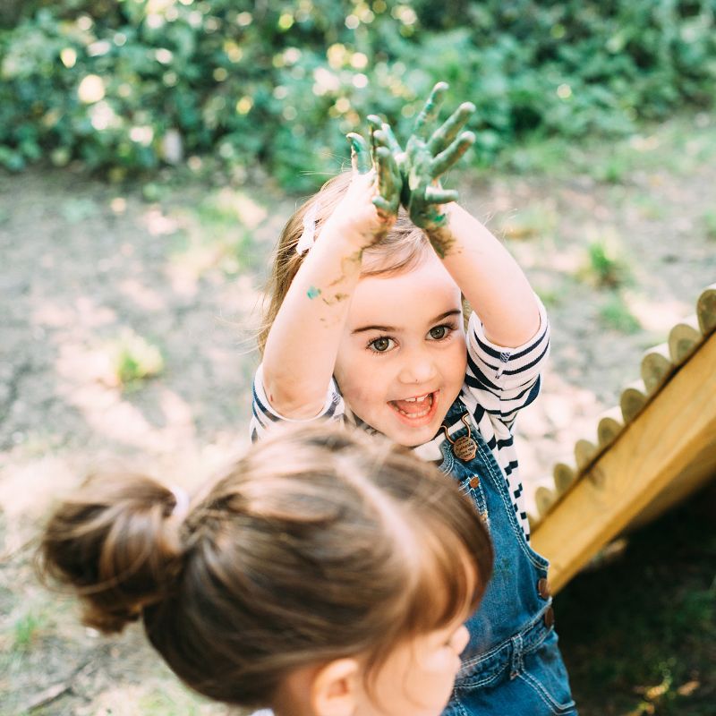 Discovery Woodland Treehouse kids playing beside it