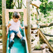 Discovery Woodland Treehouse girl on slide