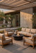 EcoSmart Fire Mimosa 40 Fire Table in the courtyard surrounded by chairs