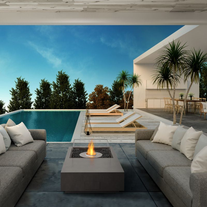 Ecosmart Fire Manhattan 50 Fire Table Natural beside the pool