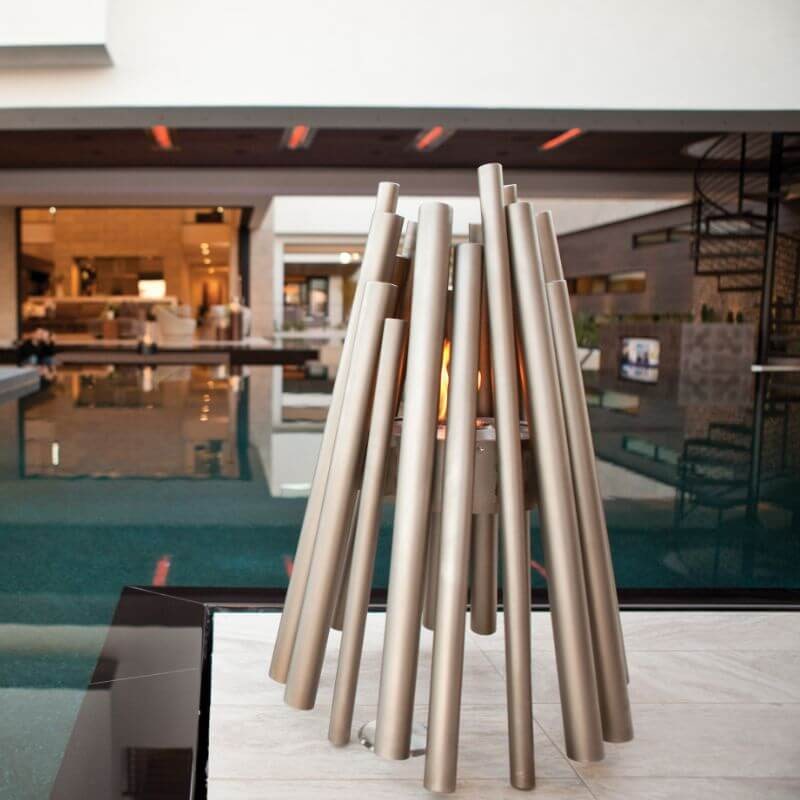 Ecosmart Fire stix fire pit full close up view beside swimming pool