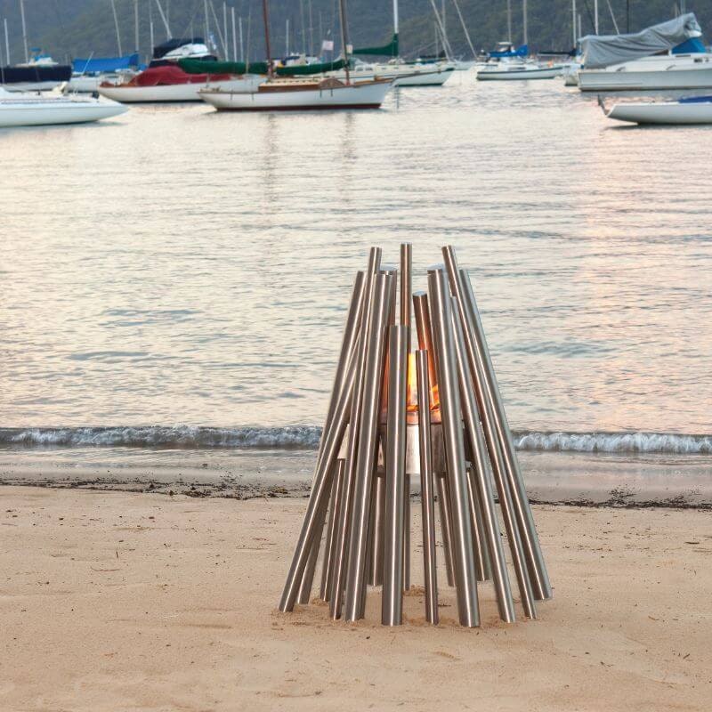 Ecosmart Fire Stix Fire Pit Stainless Steel beach background