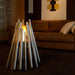 Ecosmart Fire Stix Fire Pit Stainless Steel with Brown sofa behind