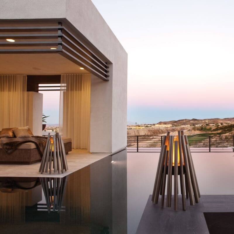 Two Ecosmart Fire stix fire pit beside Swimmng pool outdoor
