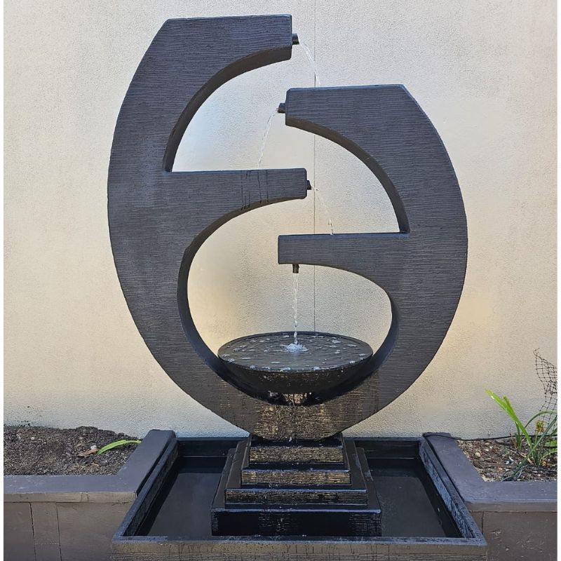 Galleria Imports New Eclipse Fountain Large Grey side lawn with white wall