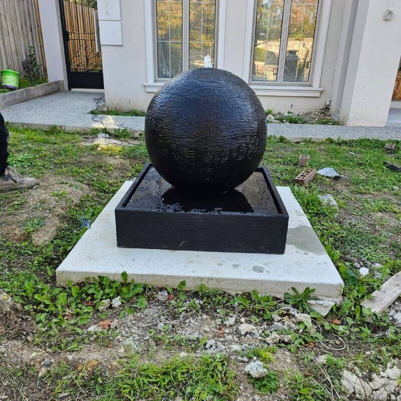 Galleria Imports Luna Ball Fountain Large Charcoal front lawn