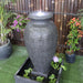 Amphora by Galleria top angle view of grey water feature looking at LED light and water