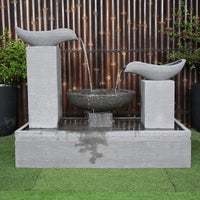 Galleria's double wave fountain in grey front view
