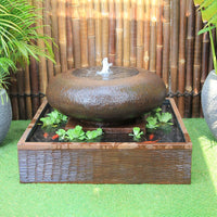 Galleria's Moon Pot Fountain in Rust
