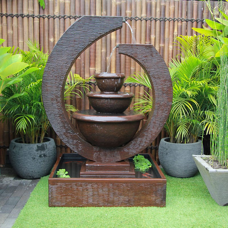 Galleria Imports Original Eclipse Large Rust front view with greenery