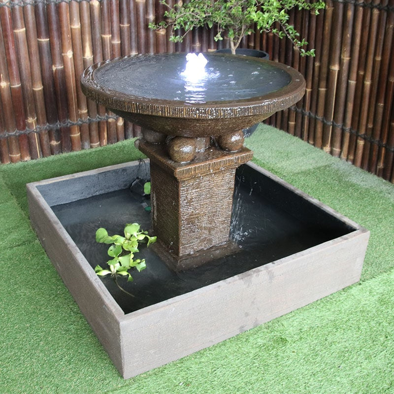 Galleria Imports Teratai Fountain in rust left angle view