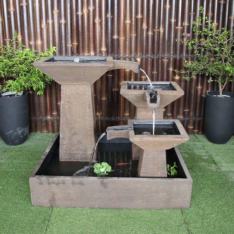 Galleria Imports 3 tier cascade fountain in medium rust front close up