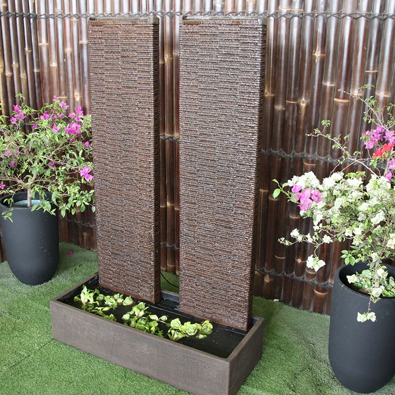 Galleria's Twin Ripple Wall Fountain in rust right angle view