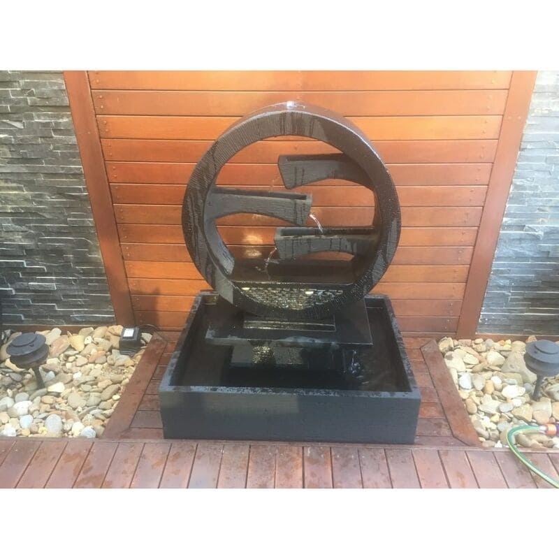 Galleria Imports Wagon Wheel Fountain Medium Charcoal with pebbles surround