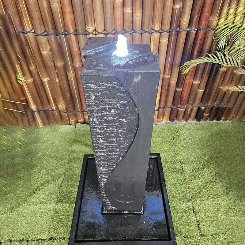 Galleria Imports Ying Yang Fountain in charcoal top view with LED light on