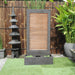 Zig Zag Copper fountain by Galleria Imports in grey in the garden