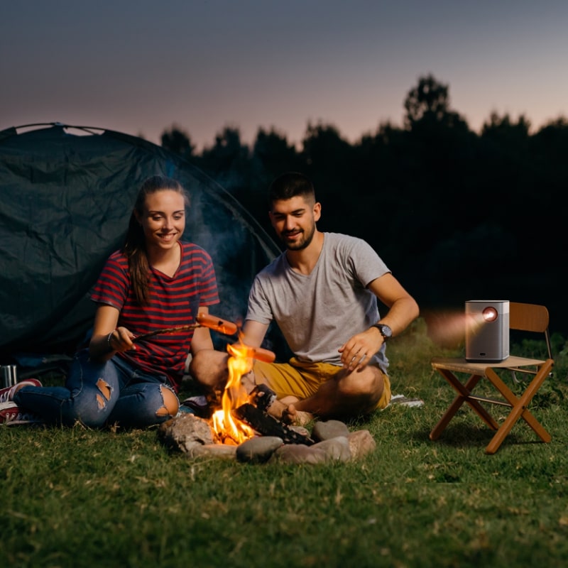 XGIMI Halo+ Portable Projector on campfire
