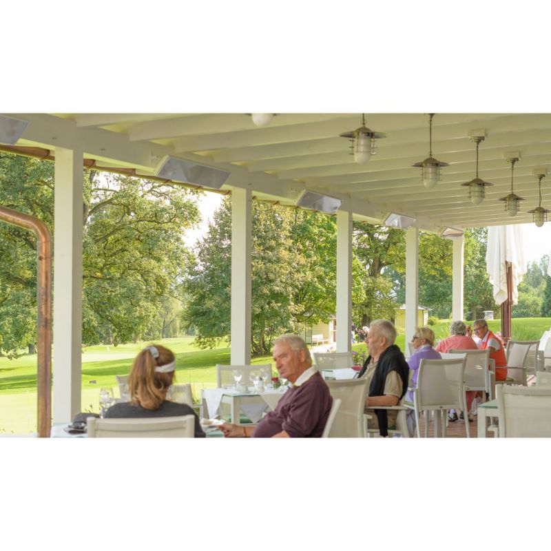 Heatscope Vision 3200W in White utdoor dining with People