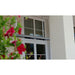 Heatscope Vision 3200W suspended by the window with Flowers