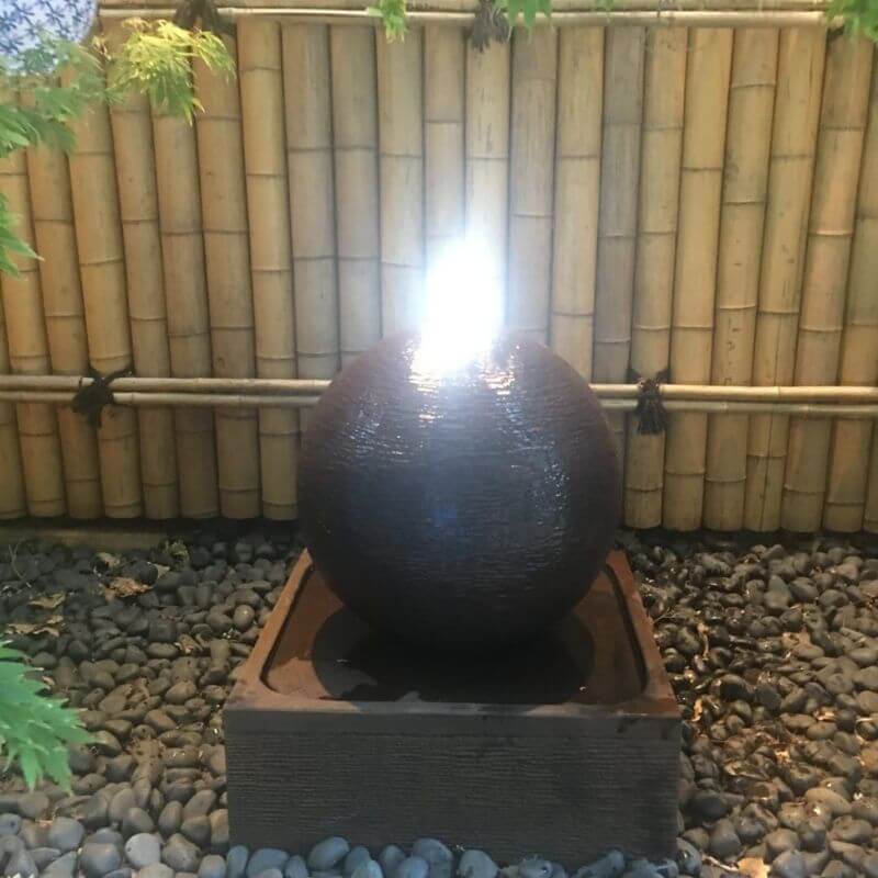Luna Ball Fountain Rust Large with lights with bamboo wall