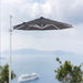 Luxi Living Alabaster 4m Round Cantilever Umbrella - umbrella setup with boat in the background.