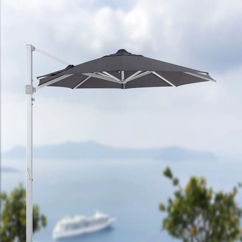 Luxi Living Alabaster 4m Round Cantilever Umbrella - umbrella setup with boat in the background.