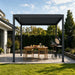 Luxi Living Atlantic Manual Freestanding Louvre Roof Aluminium Pergola - open barbeque under grey pergola
