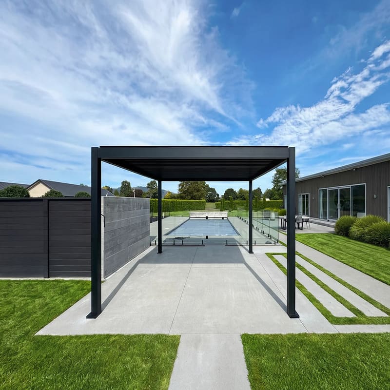 Baltic Manual Freestanding Louvre Roof Aluminium Pergola - black pergola beside a swimming pool
