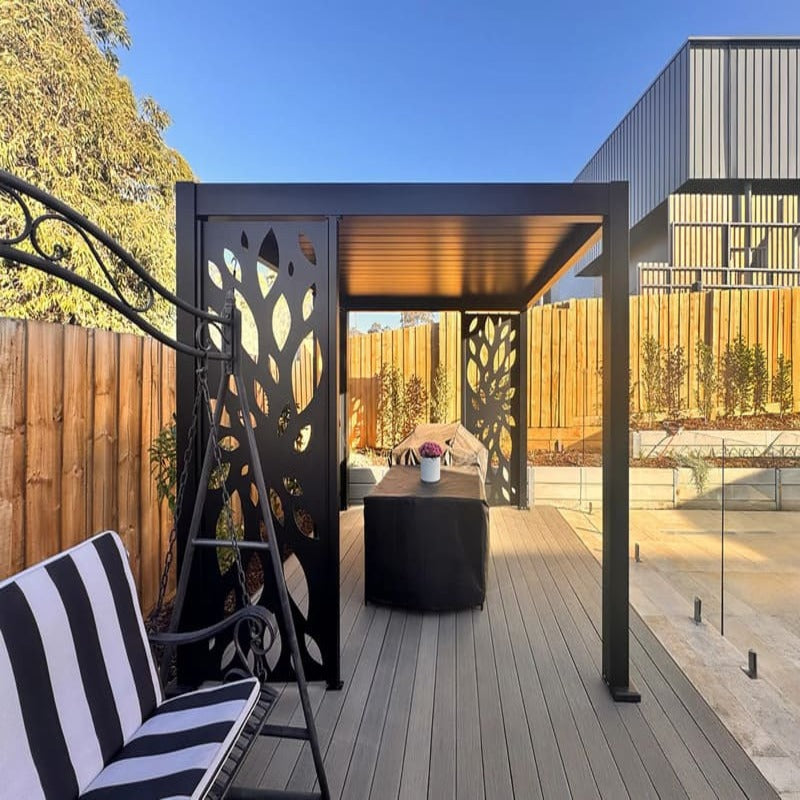 Luxi Living Baltic Manual Freestanding Louvre Roof Aluminium Pergola - patterned pergola beside a wooden fence.