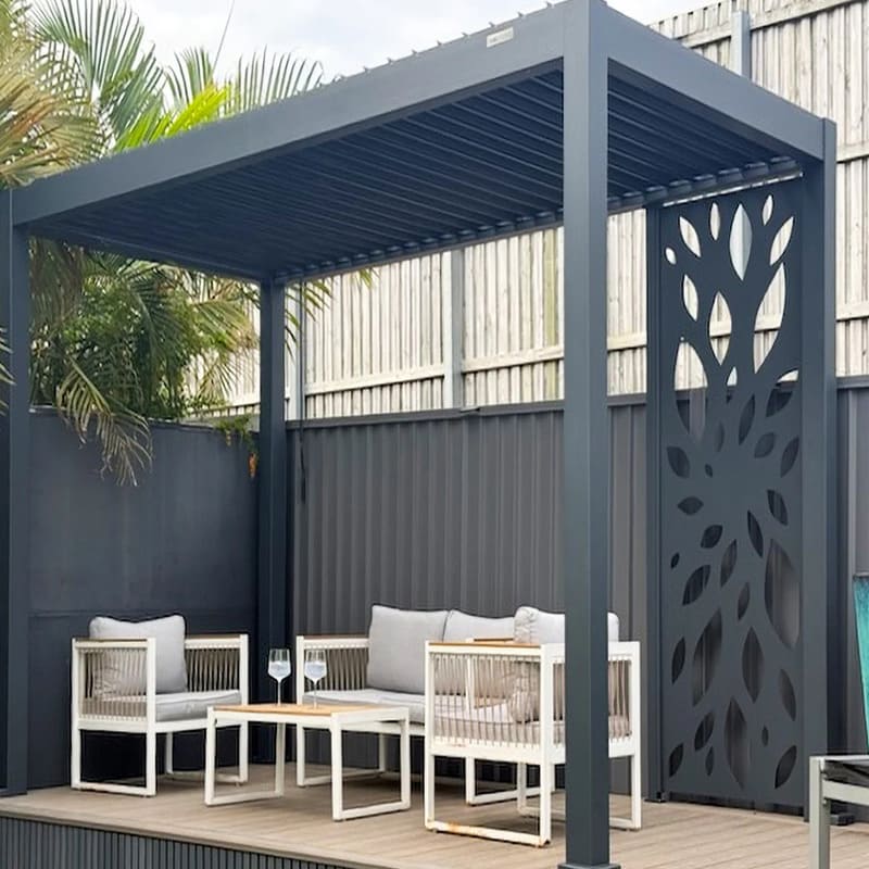 Baltic Manual Freestanding Louvre Roof Aluminium Pergola - charcoal pergola with white furniture underneath