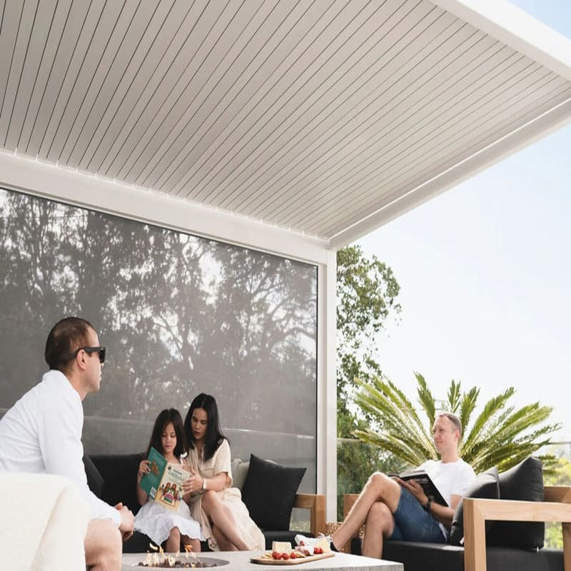 Luxi Living Baltic Manual Freestanding Louvre Roof Aluminium Pergola - Family under a pergola.