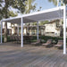 Luxi Living Baltic Manual Freestanding Louvre Roof Aluminium Pergola - very large pergola with chairs underneath