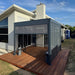 Luxi Living Baltic Motorised Freestanding Louvre Roof Aluminium Pergola- grey pergola on Wooden Floor