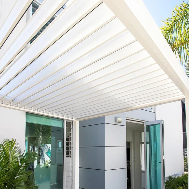 Luxi Living Baltic Motorised Freestanding Louvre Roof Aluminium Pergola - white pergola at door entrance.