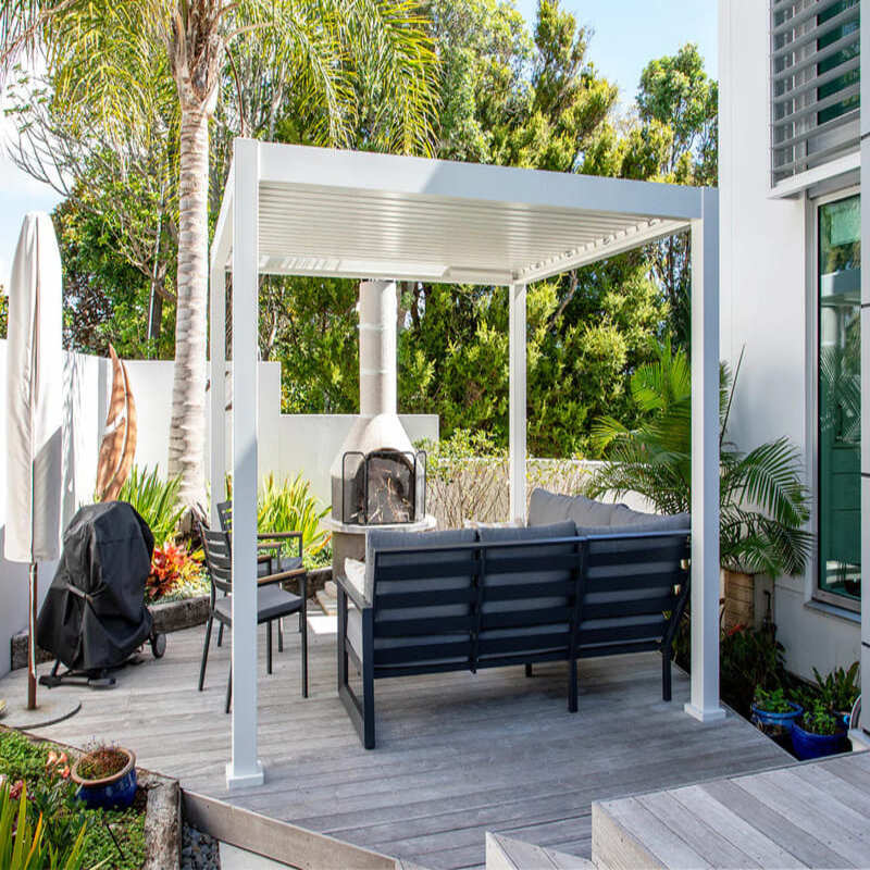 Luxi Living Baltic Motorised Freestanding Louvre Roof Aluminium Pergola - chairs under the pergola