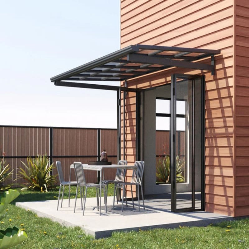 Luxi Living City Window / Door Awning Canopy on a brownish coloured house.