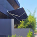 Luxi Living Fuji Manual Retractable Awning -Dark Grey Awning on Dark grey house 