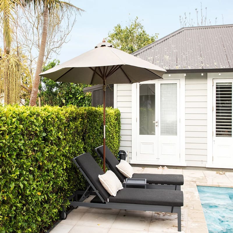 Luxi Living Nile 2.7m Round Market Umbrella - 2 chairs under the taupe umbrella by the pool