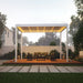 Luxi Living Pacific Motorised Freestanding Louvre Roof Aluminium Pergola - white pergola lit underneath setup on a slab