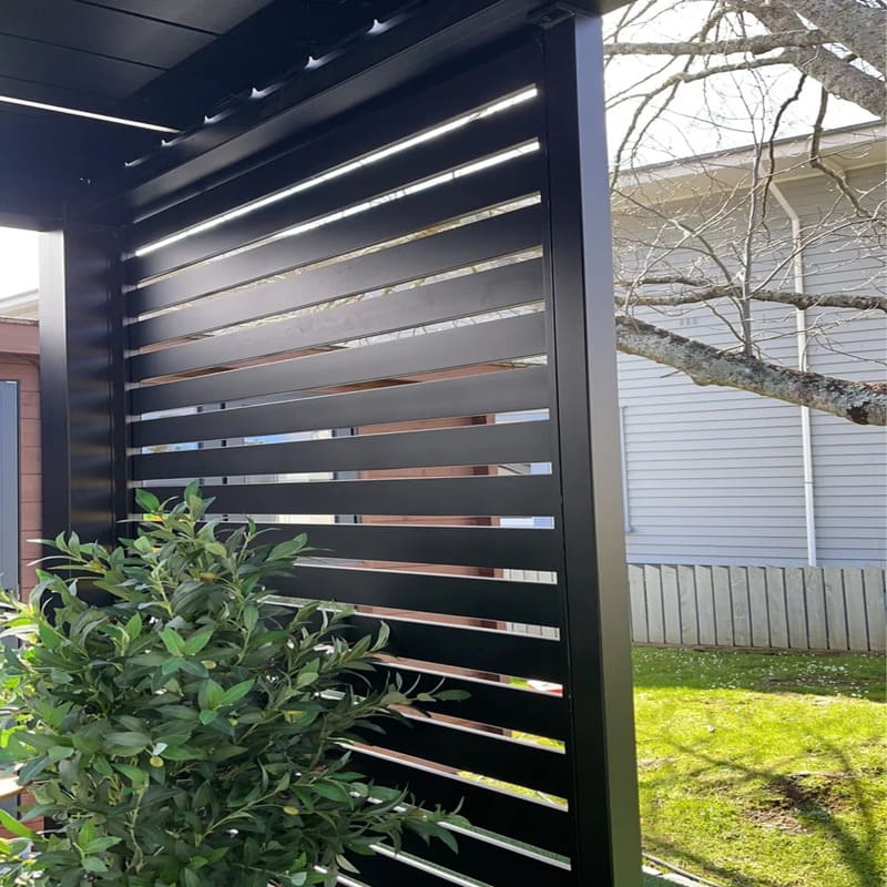 Luxi Living Slatted Privacy Wall for Baltic Freestanding Pergola setup beside the lawn